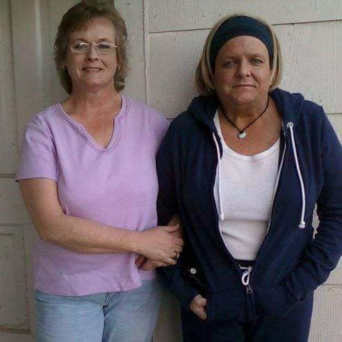 Louise Cook 770-BAM-Tree employee on the right standing next to her sister